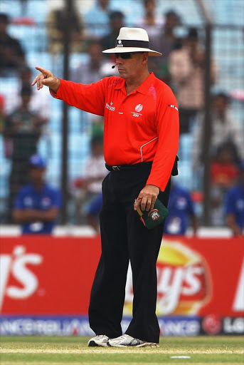Umpire Daryl Harper in action during the 2011 ICC World Cup Group B match between Bangladesh and England at Zohur Ahmed Chowdhury Stadium on March 11, 2011 in Chittagong, Bangladesh