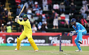 Harjas Singh of Australia plays a shot as wicketkeeper Aravelly Avanish Rao of India looks on during the ICC Under-19 Cricket World Cup South Africa 2024 final at Willowmoore Park in Benoni on Sunday.