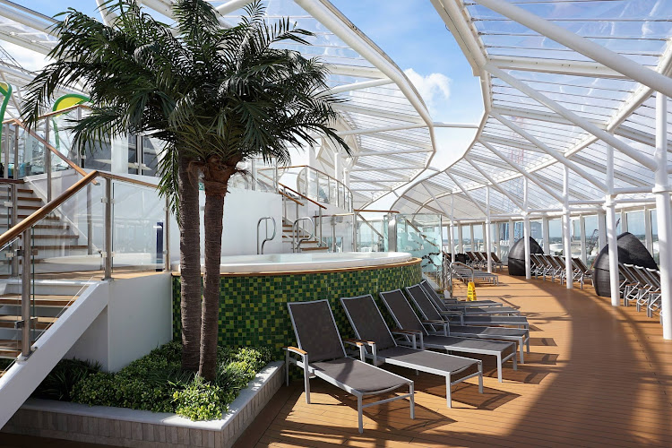 The spacious, peaceful three-story Solarium on decks 14-16 of Harmony of the Seas. 