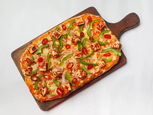 Fiery Paneer Pinsa Pizza Slice