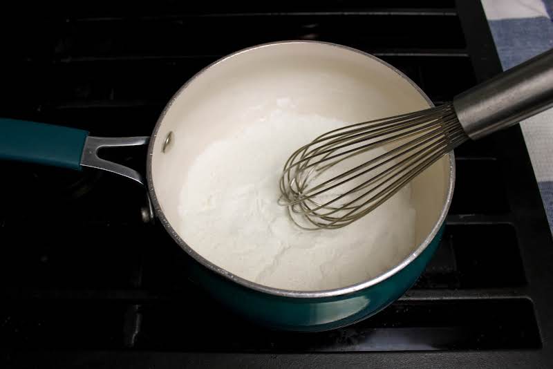 Sugar, Corn Starch, And Salt In A Saucepan.