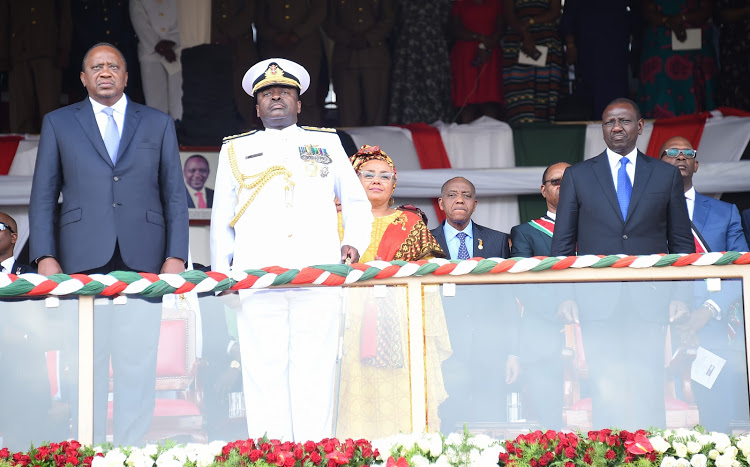 President Kenyatta, KDF chief Samson Mwathethe and DP William Ruto during the Jamuhuri Day celebrations at Nyayo National Stadium on December 12, 2019.