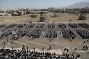 University students take part in a march during a parade by students recruited to the ranks of the Houthis as part of a mobilization campaign they have initiated recently, at the campus of Sanaa University in Sanaa, Yemen, on February 21 2024. 