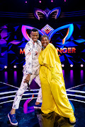 Host Mpho Popps and the unmasked Star aka Nonkanyiso 'LaConco' Conco on the Masked Singer SA