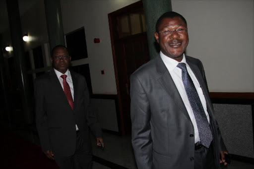 REVENGE MISSION: Kilifi Senator Stewart Madzayo and Bungoma Senator Moses Wetang’ula leave the Senate chambers yesterday.Photo/Monicah Mwangi