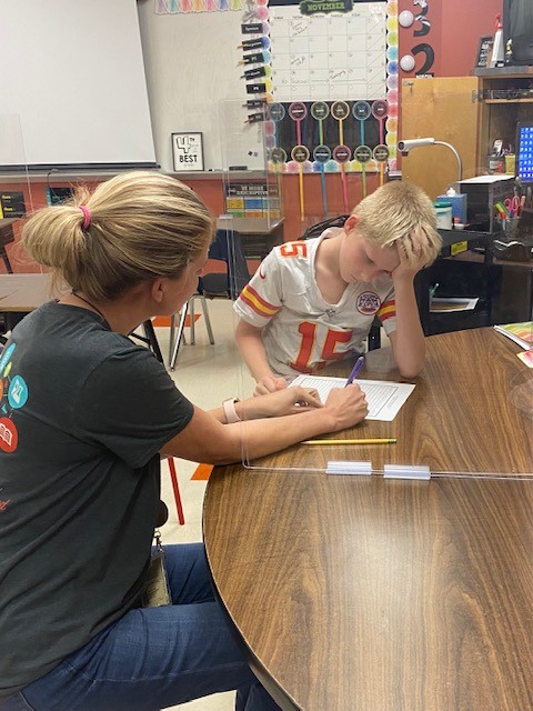 writing conference with an elementary student