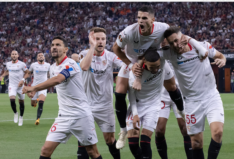 AS Roma's Bryan Cristante (L) vies with Sevilla FC's Ivan Rakitic during the 2023 UEFA Europa League Final at the Puskas Arena stadium in Budapest, Hungary, on May 31, 2023.