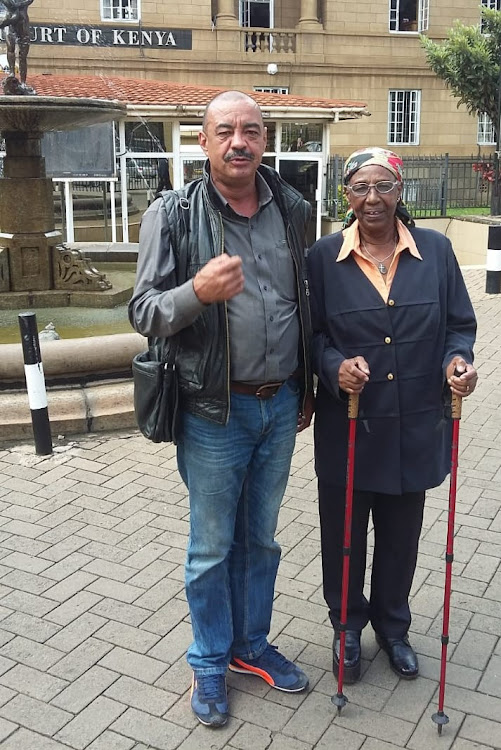 John Dames and his mother Mary Dames outside the Supreme Court in 2019. Mary has since died.