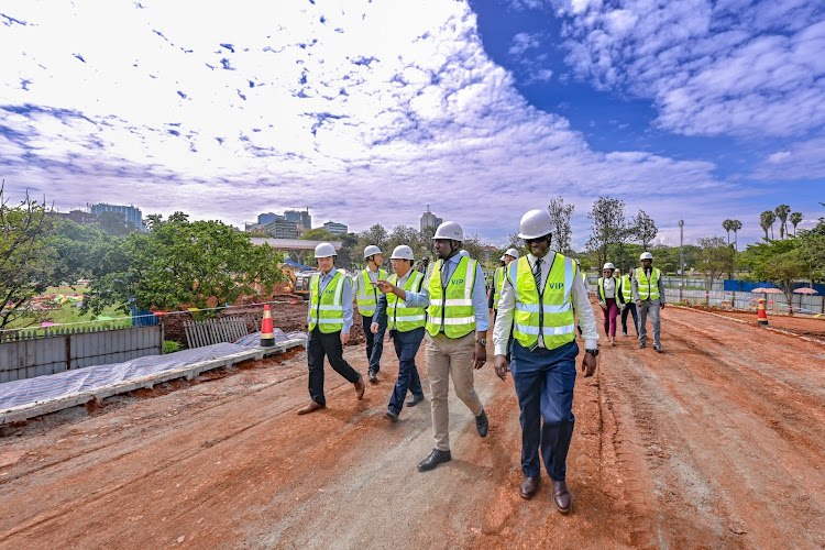 Roads and Transport Cabinet Secretary Kipchumba Murkomen with Engineers as they inspect the Nairobi Expressway on December 21, 2023.