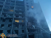 Rescue workers work at the scene of a missile strike at a location given as Bilhorod-Dnistrovskyi, Odesa region, Ukraine, in this handout image released on July 1 2022.  