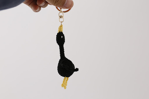 Title 4, Wool woven swan pendant hand-crocheted keychain...