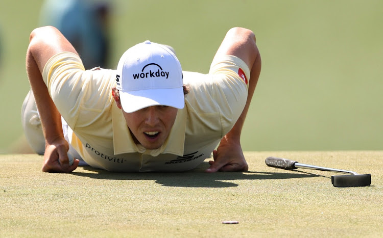 England's Matthew Fitzpatrick lines up his putt during The Masters on Friday. Picture: REUTERS/MIKE BLAKE