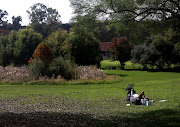 A man relaxes in a quiet park on Jan Smuts Avenue in Johannesburg on April 22 2020 during the extended lockdown. 