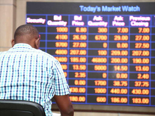 An Investors looks at the Daily tradings at the Nairobi security exchange in Nairobi on June 30,2017. PHOTO/ENOS TECHE.