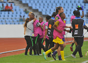 Banyana Banyana head coach Desiree Ellis celebrates with her technical team and the bench during their opening 2018 African Women's Championship against Nigeria in Gold Coast, Ghana, on November 18 2018.   