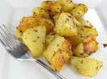 Roasted Herb Potatoes with Parmesan Cheese was pinched from <a href="http://thegardeningcook.com/roasted-herb-potatoes/" target="_blank">thegardeningcook.com.</a>