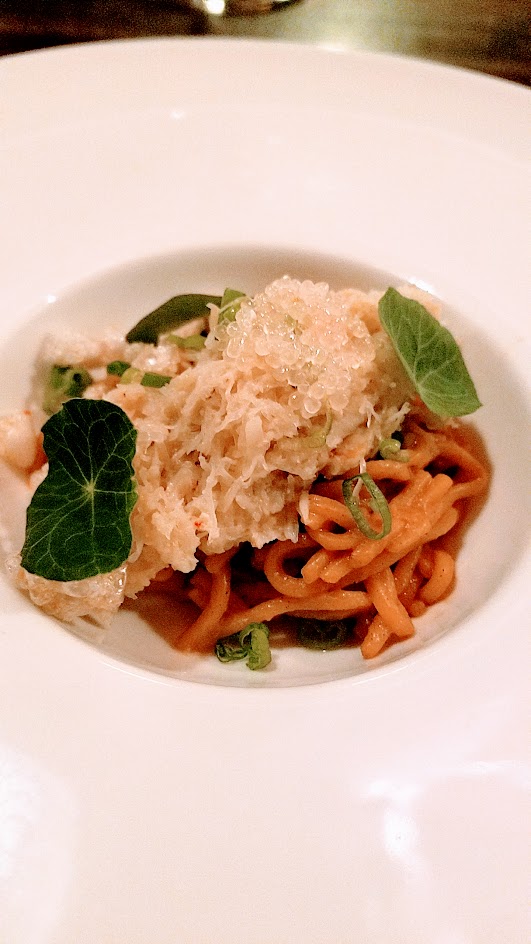 Twisted Filipino December Dinner by Carlo Lamagna Course 5: Alimasag, aka how my mom cooks noted Carlo, a dish of dungeness crab, crab roe, housemade alkaline noodles, fingerlime, and chicharron