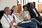 Achmat Dangor (far left), Verne Harris, Victoria Collis-Buthelezi and Mandla Langa discuss Nelson Mandela's biography. 

