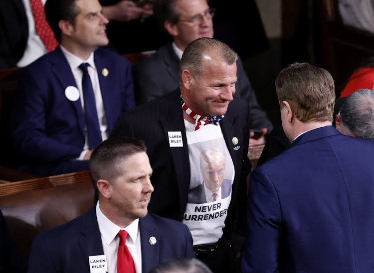 Representative Troy Nehls (R-TX) wears a shirt with the face of former President Donald Trump in the chamber before US President Joe Biden delivers the State of the Union address at the US Capitol in Washington, D.C., March 7, 2024.