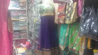 Om Sai Redymade & Saree Center photo 1