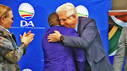 Alan Winde embraces DA’s Western Cape leader Bonginkosi Madikizela after being nominated as the DA’s Western Cape premier candidate on September 19 2018. 