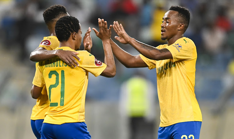 Lebohang Maboe ofLebohang Maboe FC congratulates both Sphelele Mkhulise of Mamelodi and Themba Zwane of Mamelodi Sundowns FC after he scored during the Absa Premiership 2019/20 football match between Amazulu and Mamelodi Sundowns at Moses Mabhida Stadium on 04January 2020.