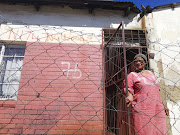 Yvonne Lekoma outside her home in Kliptown, Soweto, as special votes are cast on Monday in advance of Wednesday's poll.
