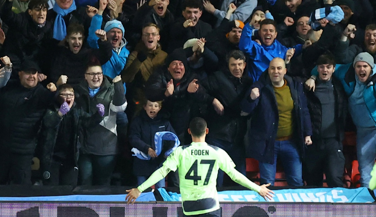 Manchester City's Phil Foden celebrates scoring their second goal in their FA Cup fifth round win against Bristol City at Ashton Gate Stadium in Bristol on February 28 2023.