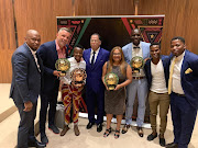 Confederation of African Football (Caf) Women's Player of the Year Thembi Kgatlana poses with her award along with her coach Desiree Ellis and Mamelodi Sundowns goalkeeper Denis Onyango and other SA dignitaries in Dakar in Senegal on Tuesday January 8 2018.   