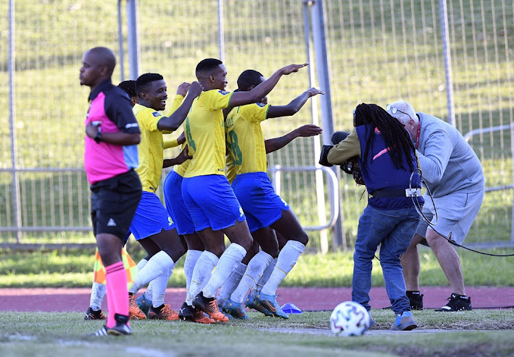 Thabiso Kutumela (obscured) of Mamelodi Sundowns celebrates his goal in the DStv Premiership match against Royal AM at Chatsworth Stadium on May 23 2022.