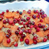 Thumbnail For Layering Potato Slices, Cranberries, Brown Sugar, And Butter.