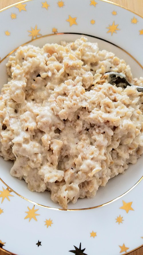 Savory Oatmeal Recipe, toast the oatmeal, cook with a milk water mixture, and add parmesan