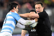 New Zealand's Ben Smith is tackled by Argentina's Matias Moroni during the Rugby Championship match at Trafalgar Park in Nelson, New Zealand on September 8, 2018.  