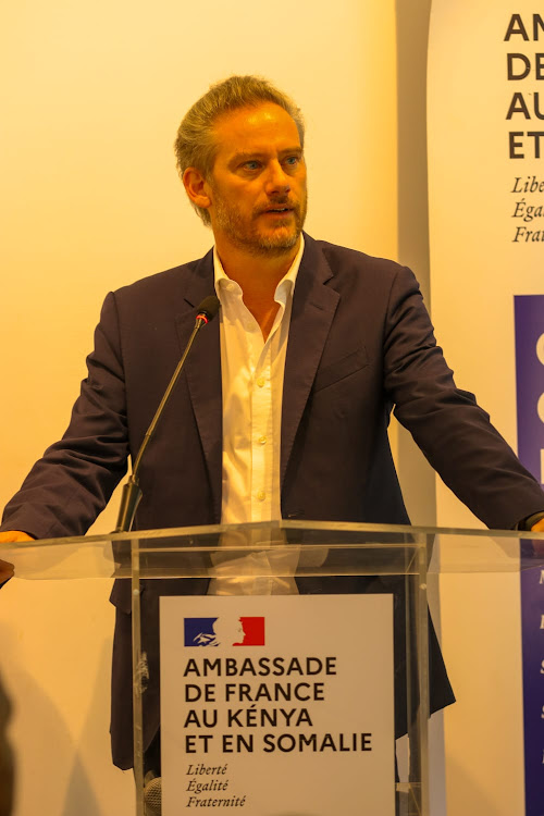 France ambassador to Kenya Arnaud Suquet speaking during the project signing ceremony at the French Embassy Residence in Nairobi