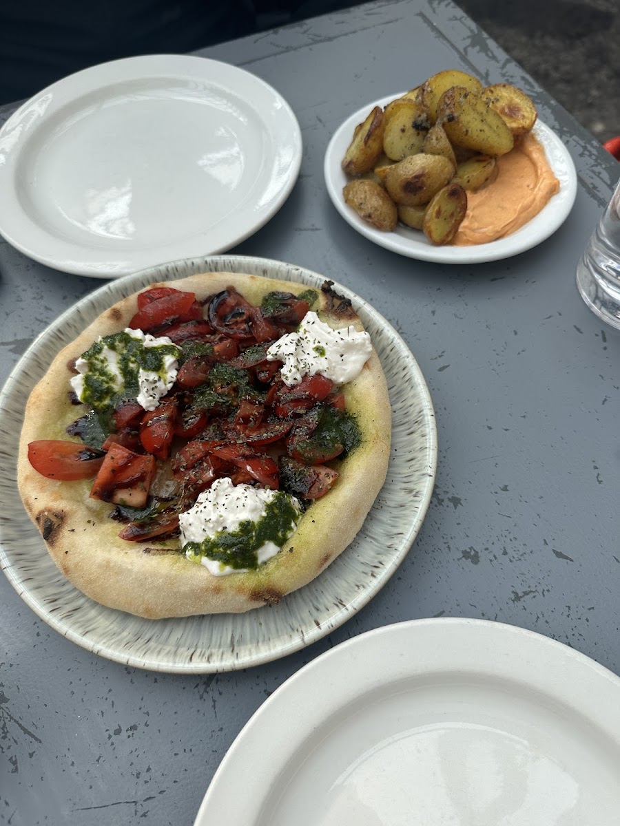 Garlic bread tomato and roast potato starter