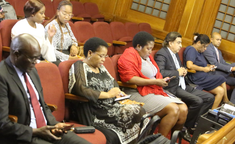 The accused in the Nulane Investments R24.9m fraud and money-laundering case are, from left to right, Peter Thabethe, Limakatso Moorosi, Seipati Dhlamini, Iqbal Sharma, Ronica Ragavan and Dinesh Patel. Picture: ZIPHOZONKE LUSHABA.