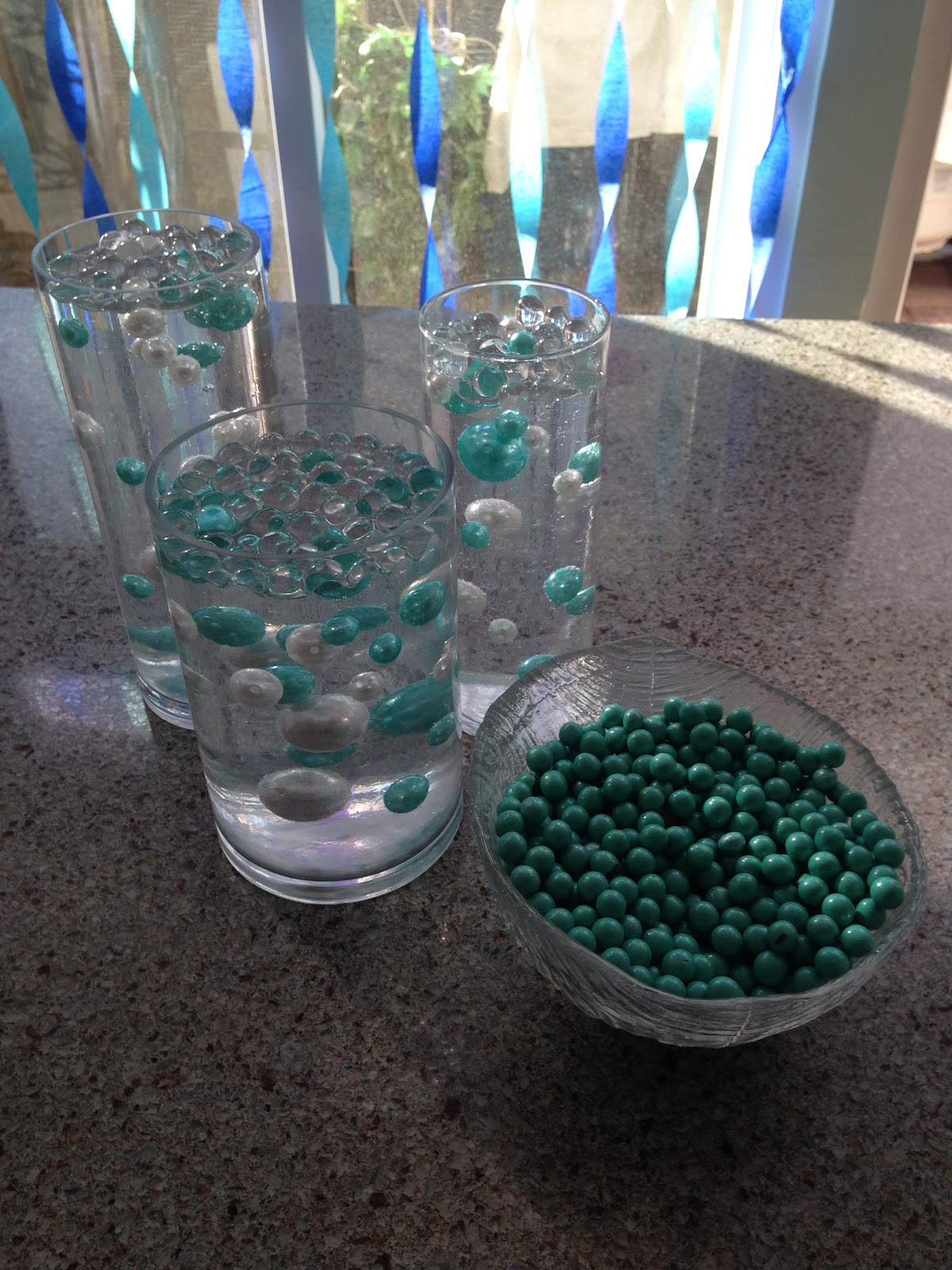 floating beads in vases for mermaid party