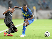 Thembinkosi Lorch of Pirates and Ayanda Patosi of City during their match on Wednesday. 