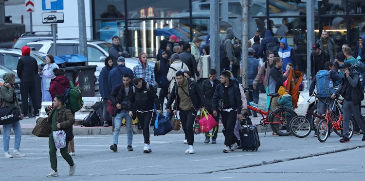 Travellers from Russia cross the border to Georgia at the Zemo Larsi/Verkhny Lars station in Georgia, September 26 2022. Picture: IRAKLI GEDENIDZE/REUTERS