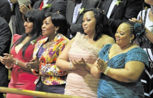 SUPPORTIVE: Nelson Mandela's granddaughter Ndileka with First Ladies Bongi Ngema, Thobeka Madiba and Nompumelelo Ntuli cheer after the speech.