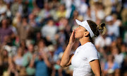 Simona Halep of Romania celebrates defeating Paula Badosa of Spain in their fourth round match at The Championships Wimbledon 2022 on July 4 2022.