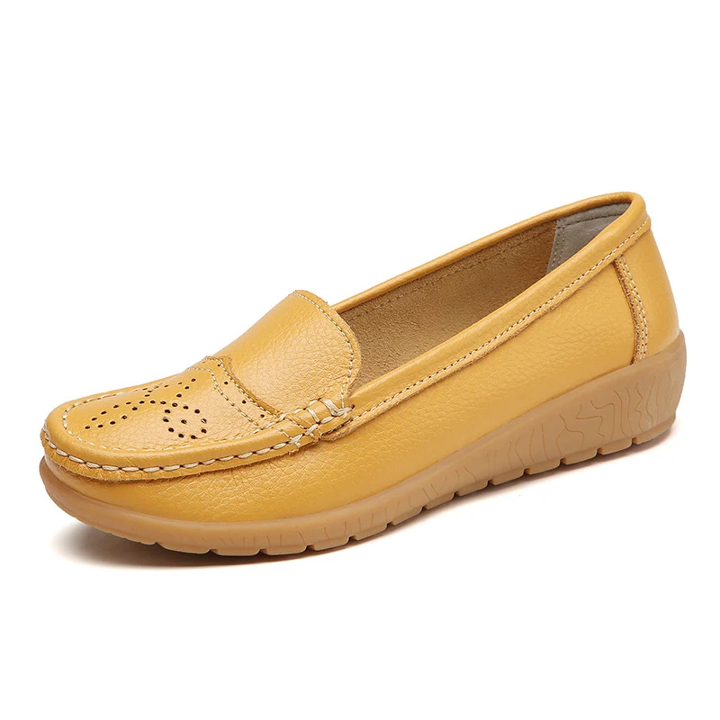 Scarpe donna con zeppa, traforate e semplici, suola morbida. Comfort e stile per un look casual e alla moda, perfette per l'uso quotidiano.