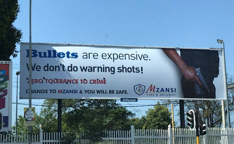 The controversial billboard erected on November 9 by Mzansi Fire & Security at the Malvern, Ridley Park junction in Durban.