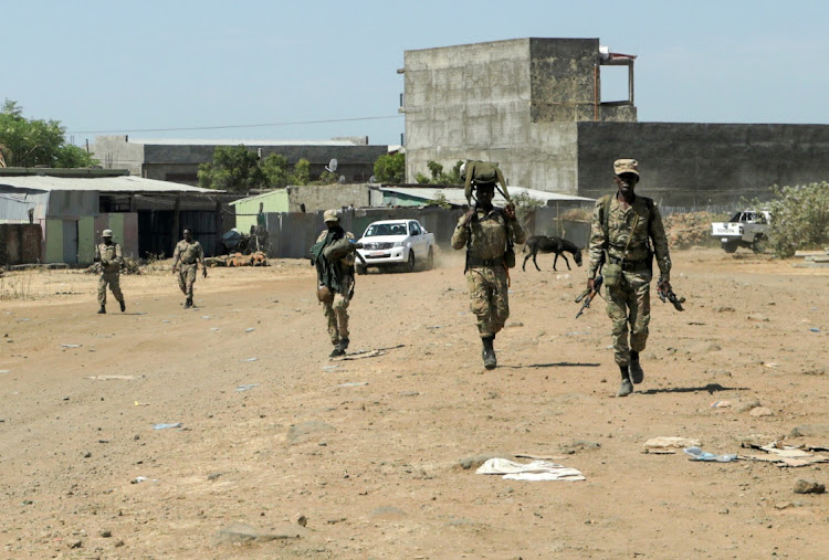 Members of the Amhara Special Force return to the Dansha Mechanized 5th division Military base after fighting against the Tigray People's Liberation Front (TPLF), in Danasha, Amhara region near a border with Tigray.