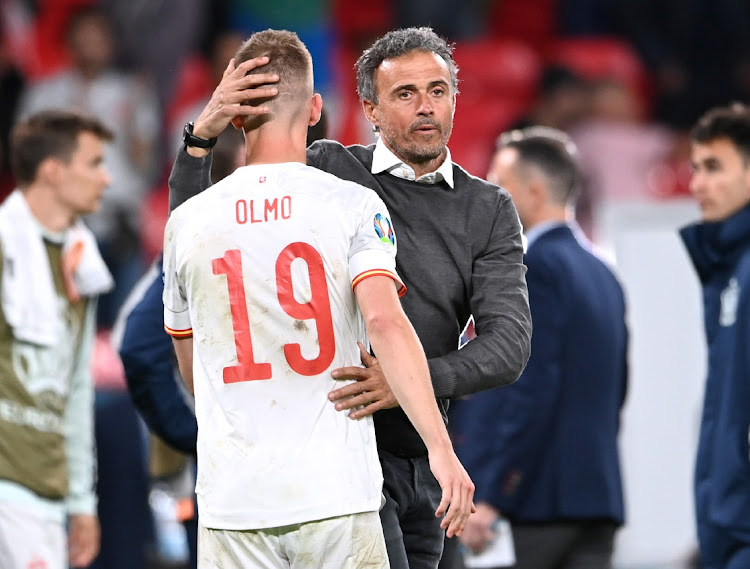 Spain coach Luis Enrique with Dani Olmo after the Euro 2020 semifinal loss to Italy at Wembley Stadium, London on July 6, 2021