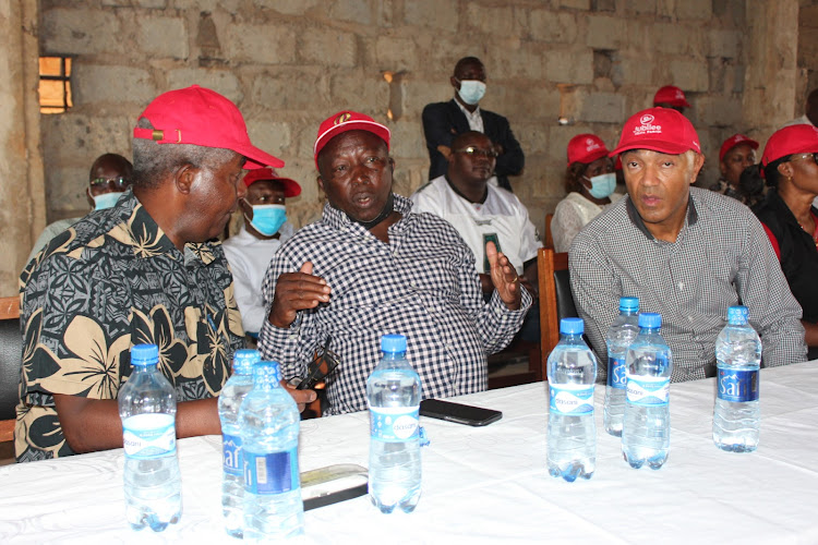 Former Murang'a Senator Kembi Gitura, nominated MP Maina Kamanda and former Gatanga MP Peter Kenneth during Jubilee party popularisation drive in Kangema on Friday.