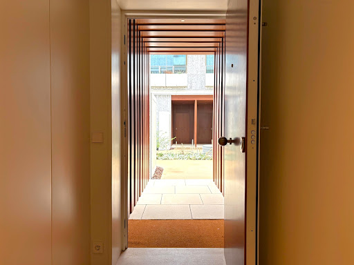 Entrance with stylized corridor to exterior in this luxury villa for sale in Porto ($1,616,824 - 175 m²)
