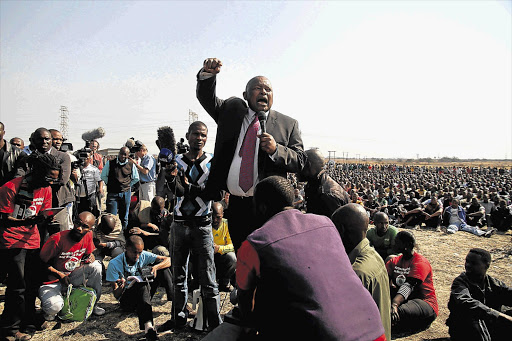 COPE's President Mosiuoa Lekota addresses thousands of Lonmin mine workers in Marikaana. Picture: Moeletsi Mabe