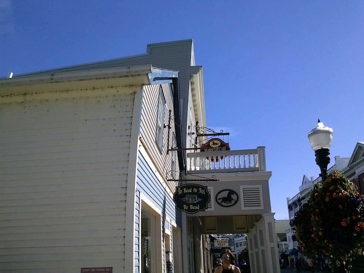 The sign for the restaurant is one story up and can be difficult to spot.