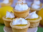 Lemon Meringue Cookie Cups was pinched from <a href="http://www.momontimeout.com/2014/01/lemon-meringue-cookie-cups/" target="_blank">www.momontimeout.com.</a>